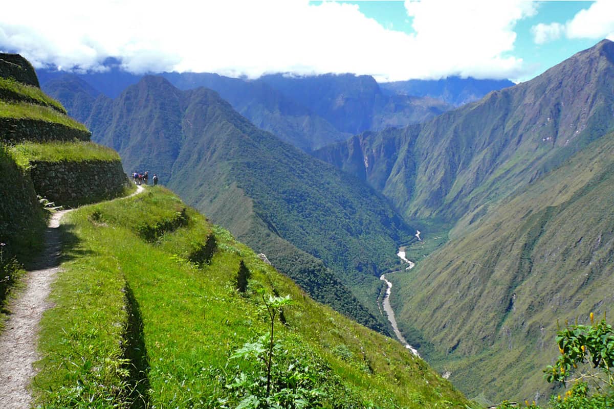 A river winding into the distance between mountains