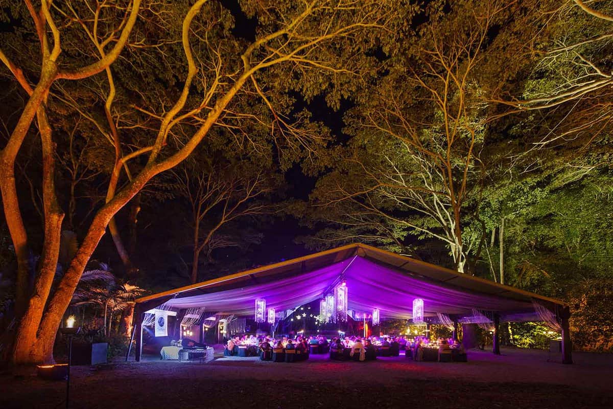 Tented venue lit up at the Flames of the Forest