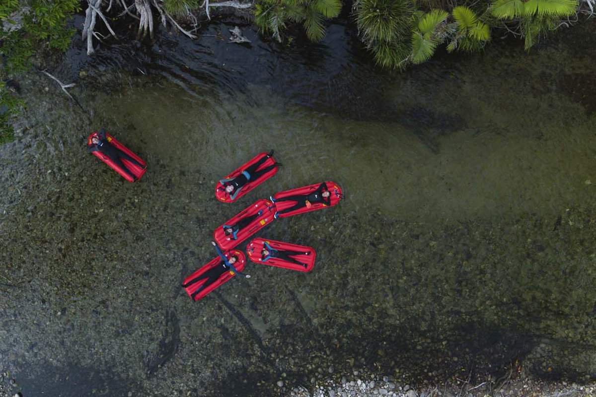 Aerial view of a group of drifters io red floats