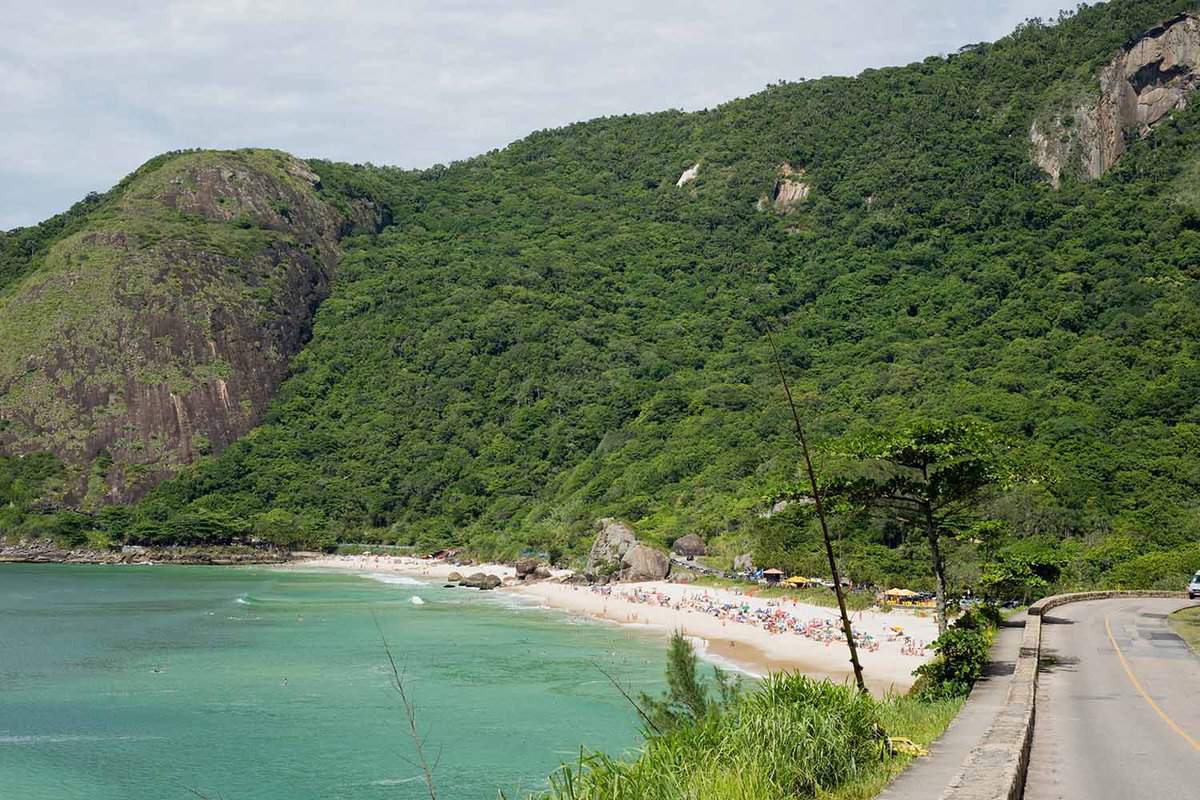 Beach with large mountain in background
