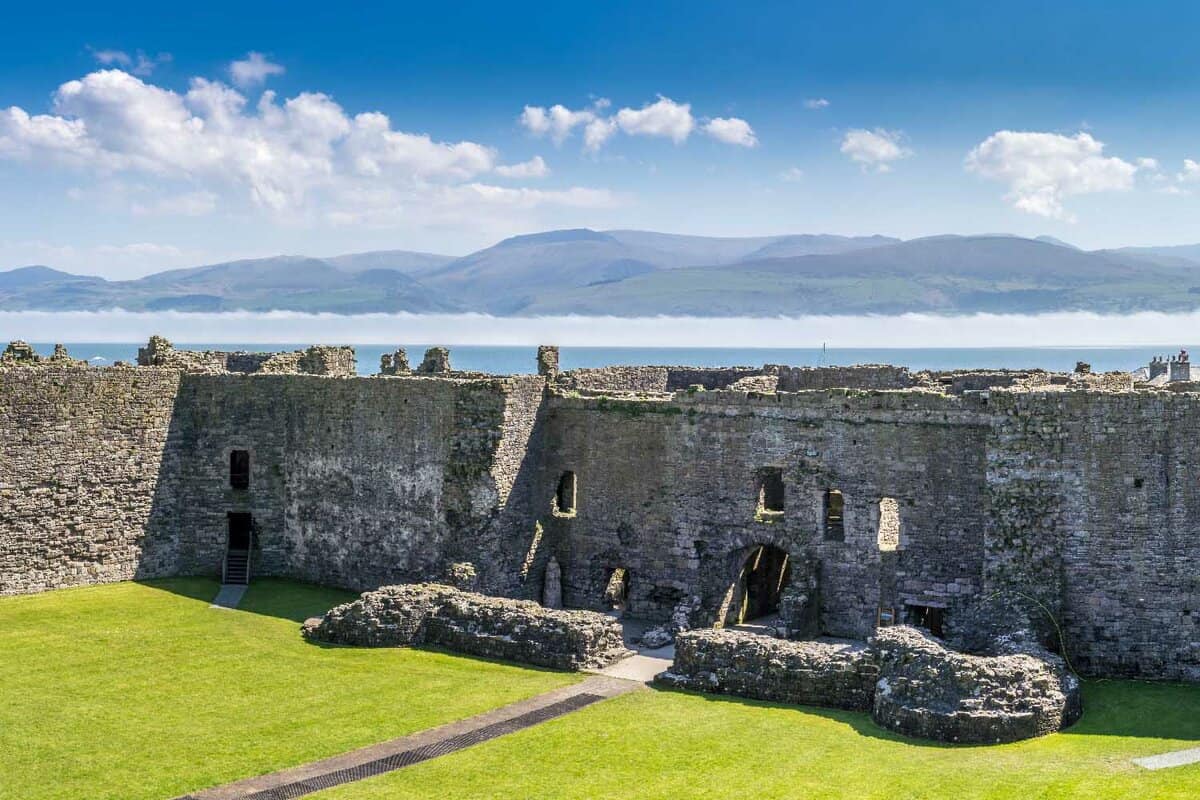 Menai Straits with low mist viewed from inside Beaumaris castle, anglesey north Wales, UK.