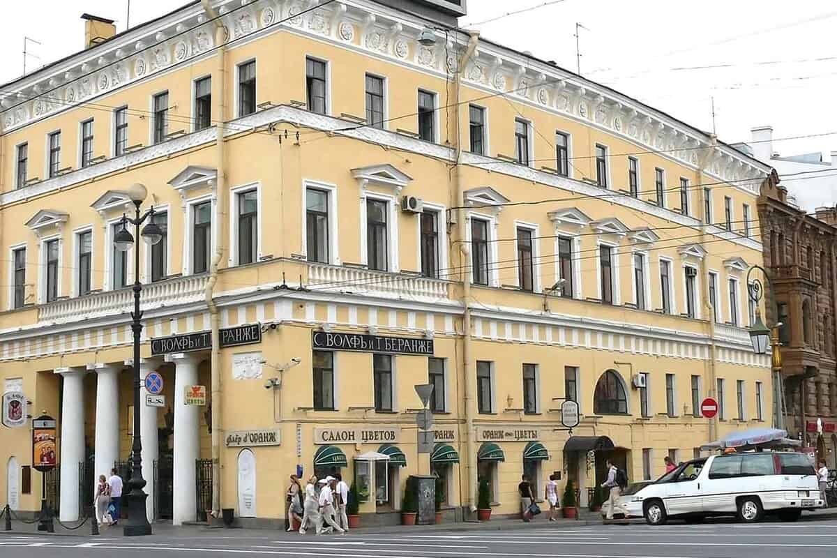 Pale yellow building on corner of street