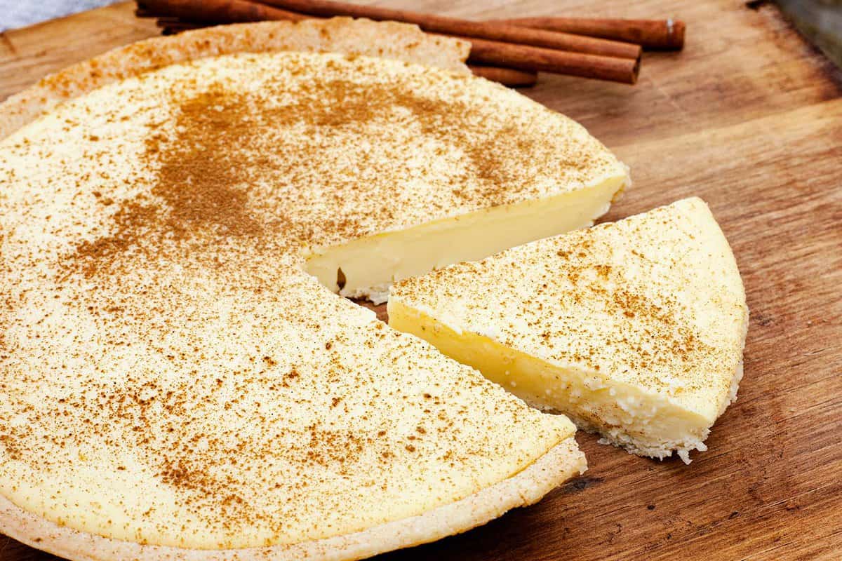 traditional South African milk tart on a rustic farm style table