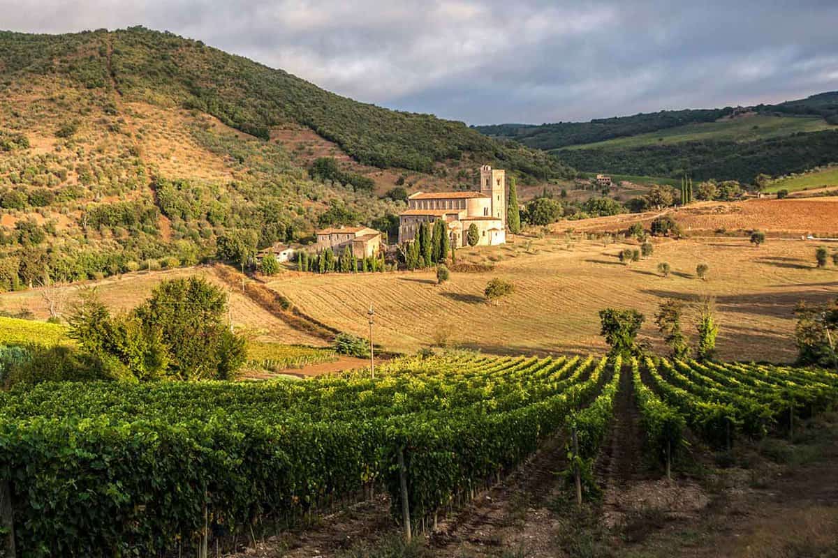 Sant Antimo Monastery is embedded between the vineyards of the beautiful landscape of Tuscany in northern Italy