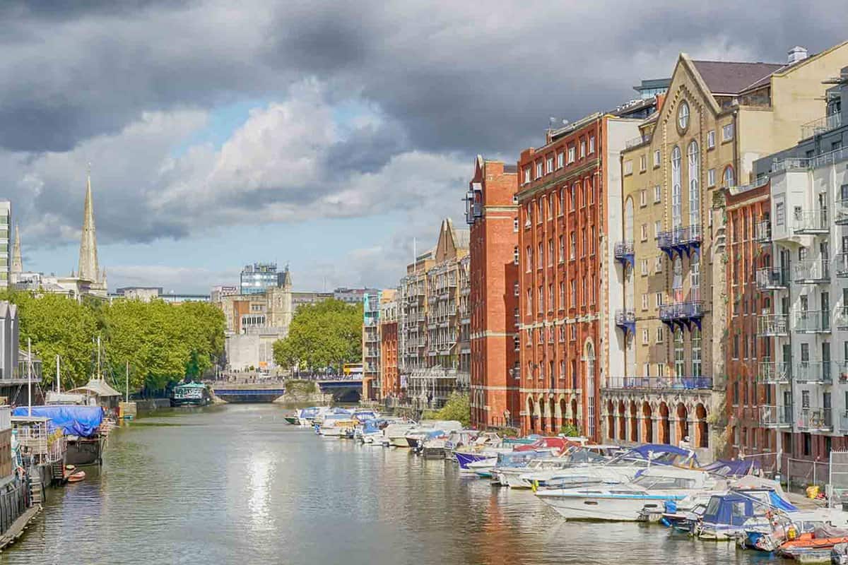 Riverfront houses and canal boats on the main docks