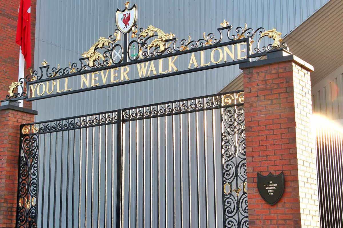 Red bird logo on the gate of Liverpool Football Club at Anfield Stadium in Mersyside. You'll never walk alone is slogan of the club.