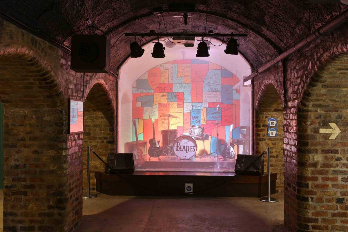 Screen showing a film of the fab four