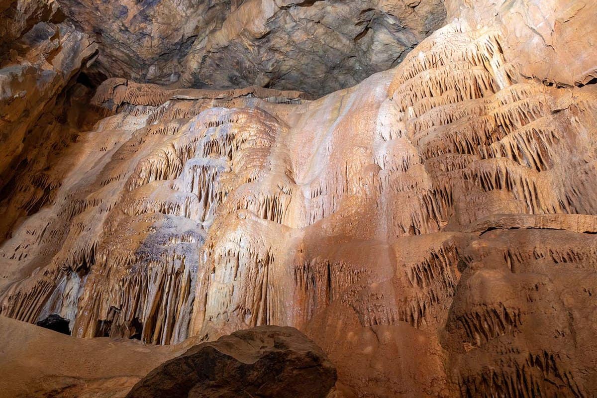 Spectacular lit Rock formations in Gough's cave in Cheddar gorge