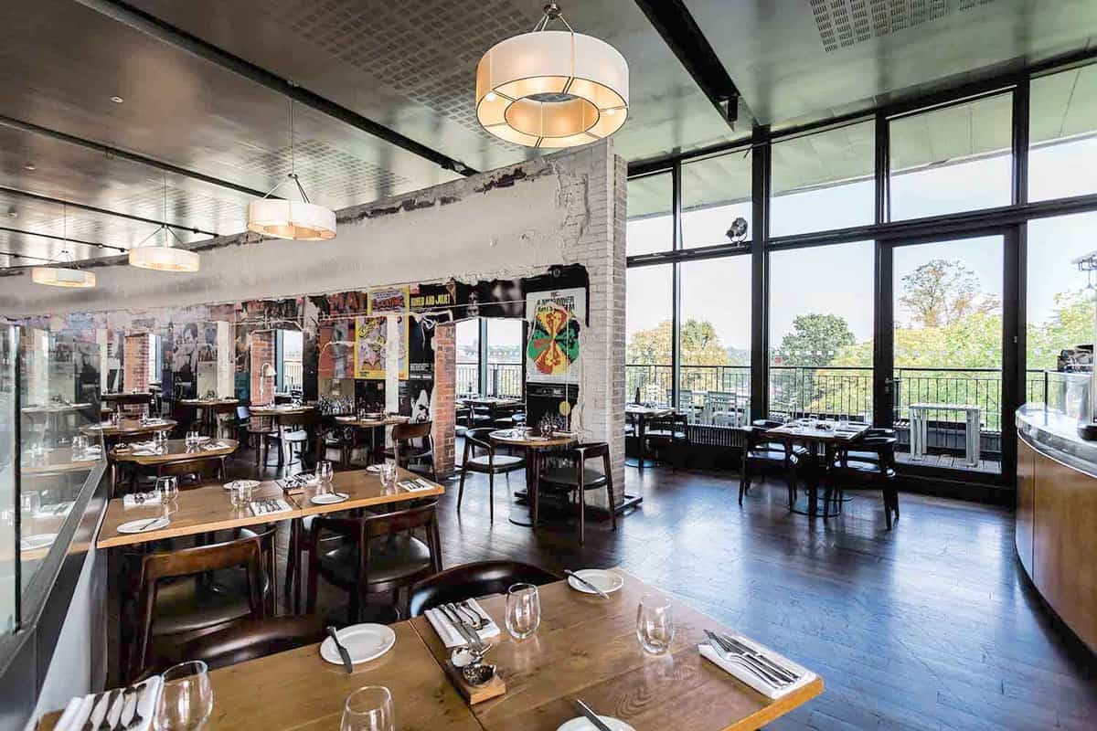 Inside view of the rustic and modern interior at the Rooftop restaurant in Royal Shakespeare Company