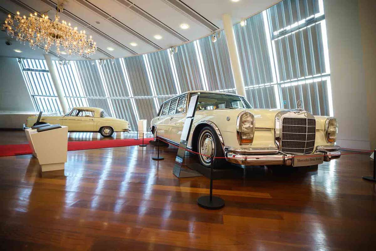 A white Mercedes limousine on display at MB world.