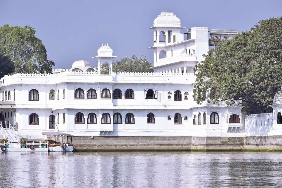 Close up of the white marble walled exterior of the Taj Lake Palace