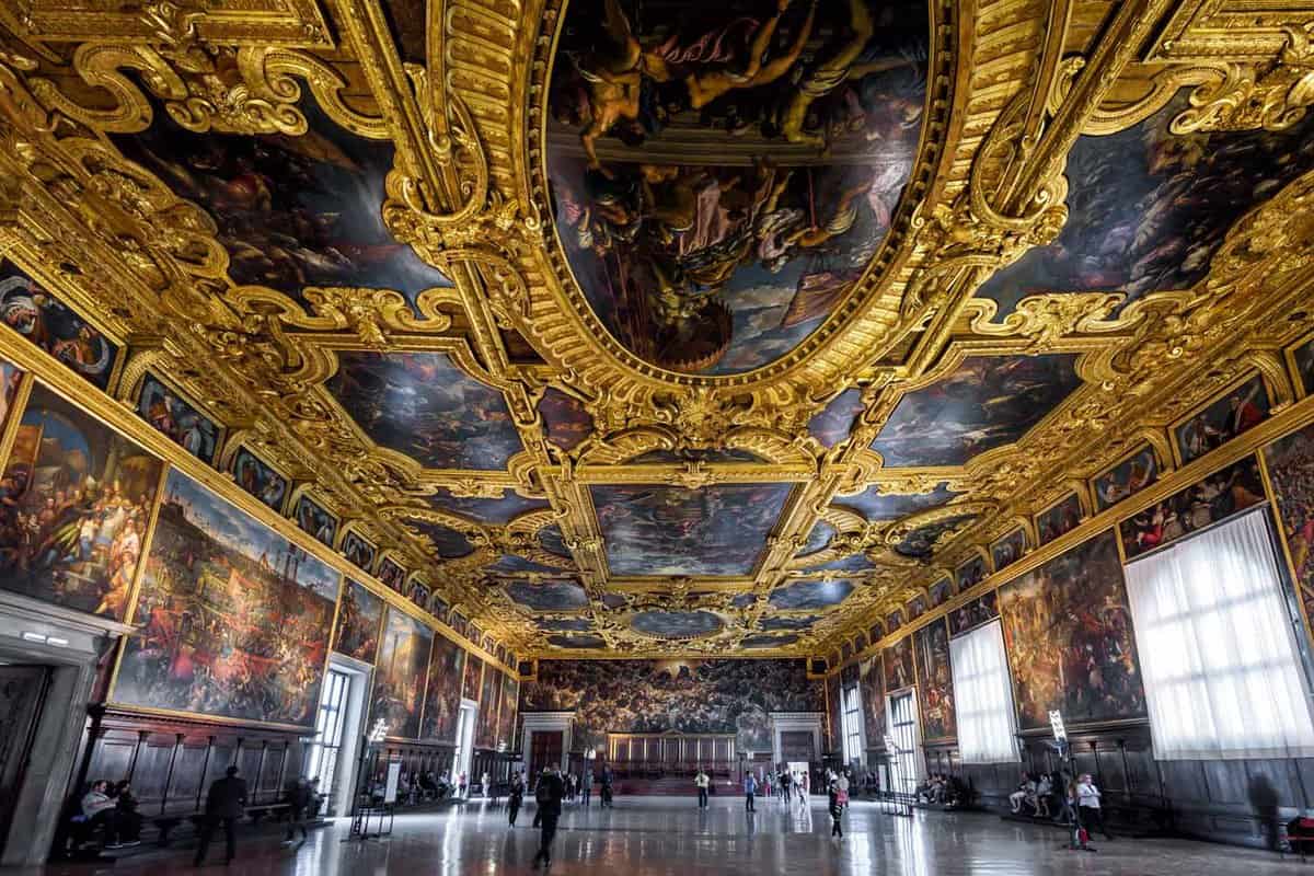 Interior of the Doge`s Palace (Palazzo Ducale), panorama of the Higher Council Hall with painted walls and ceiling.