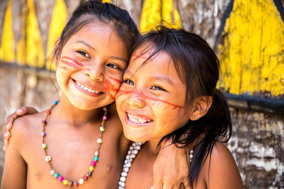 two beautiful young indian girls cuddling