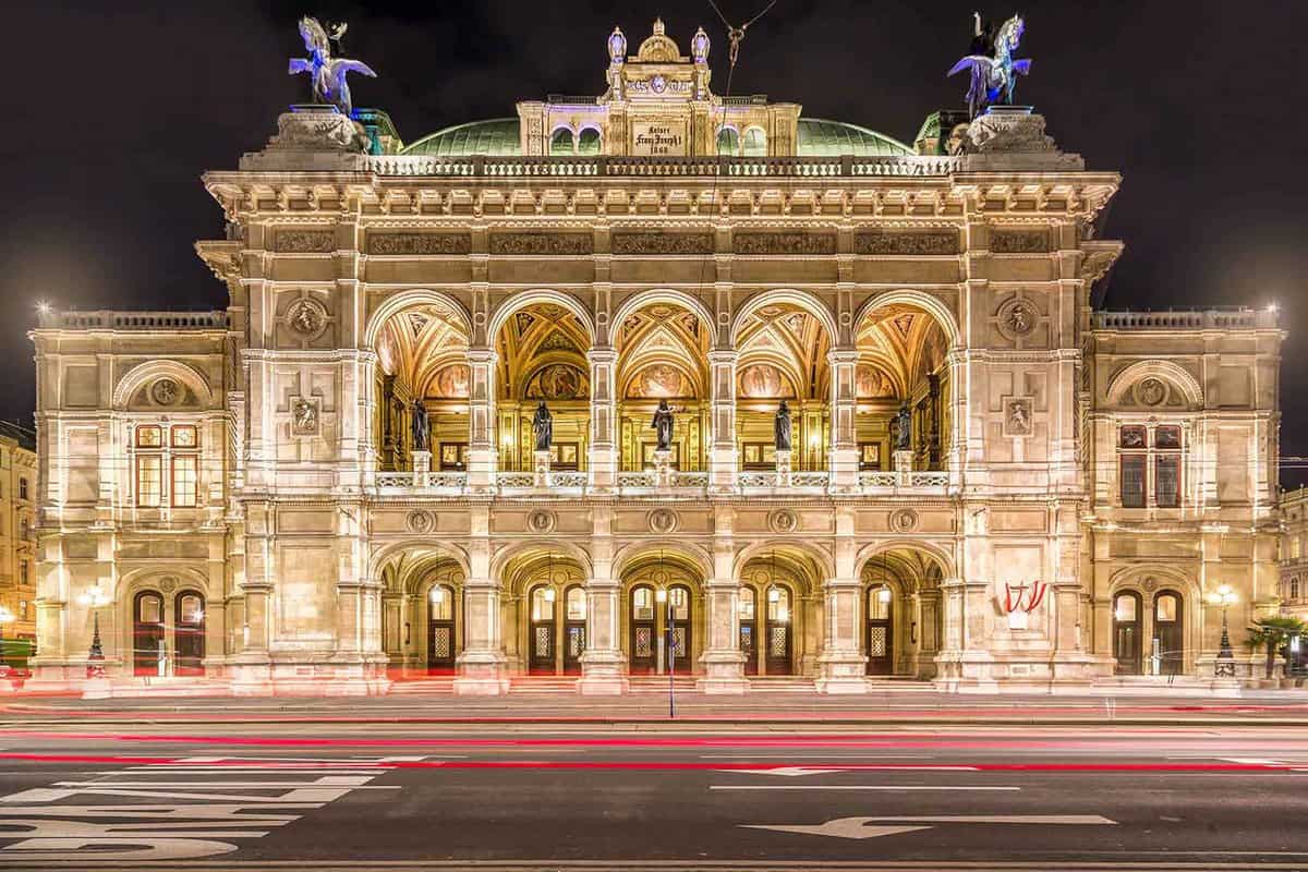 Opera house lit up at night