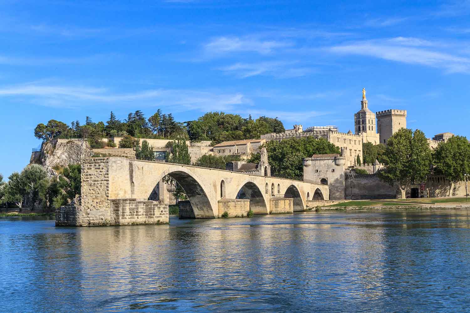 Avignon's historic bridge jutting out into the river