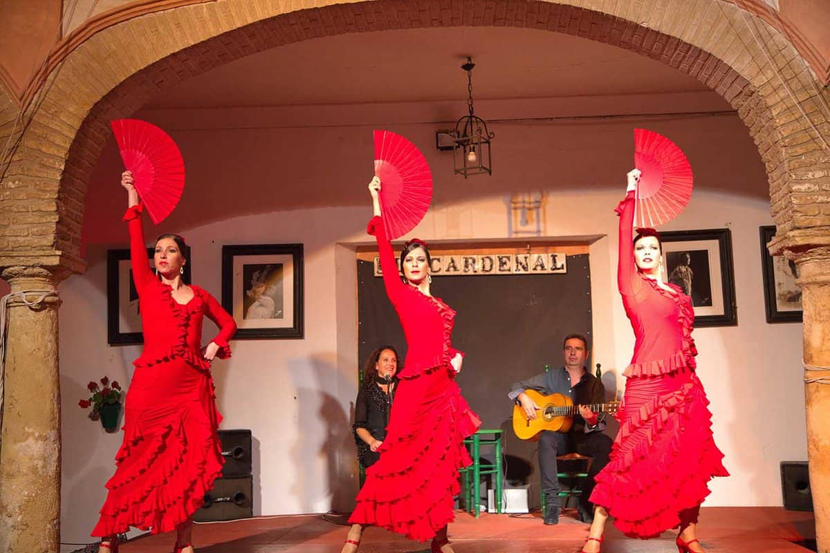 Flamenco dancers and singers performing at Tablao El Cardenal Flamenco Show