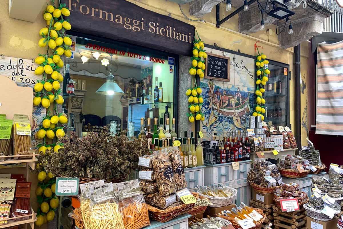 Street shop Sicilian cheeses with traditional Sicilian specialties, pasta, lemons and souvenirs.