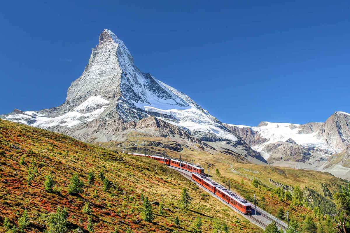 The mountain Gornergrat Railway between Zermatt and Gornergrat in front of the Matterhorn. Swiss alps. Lovely alpine landscape